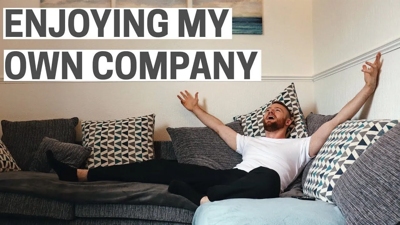 YouTube thumbnail: Ollie stretched out on a sofa, arms wide, under the words “Enjoying my own company”