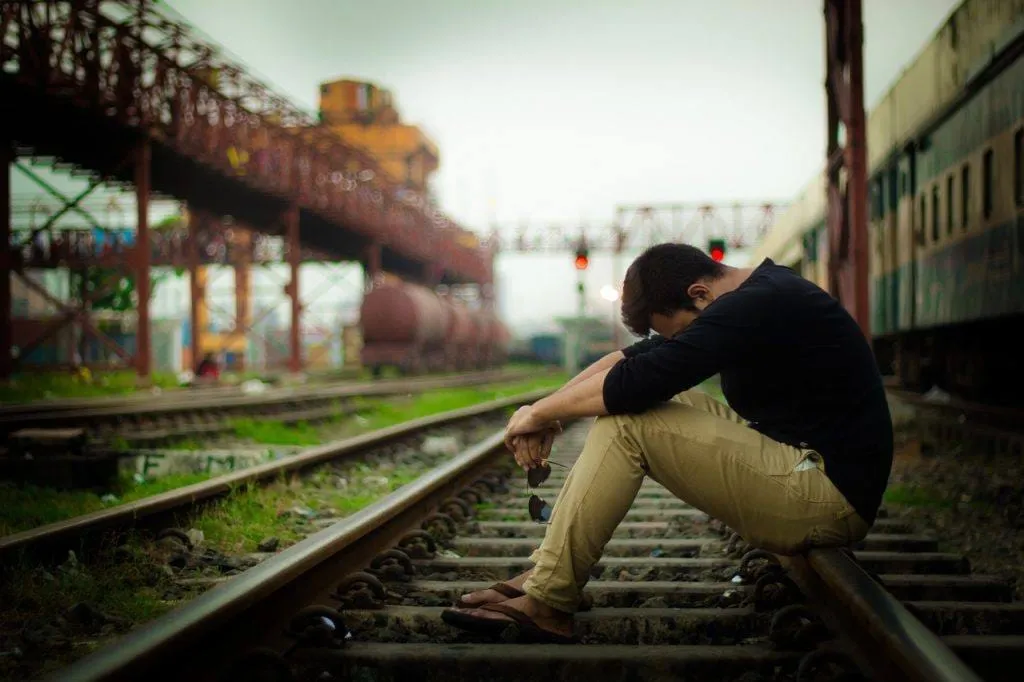 Sad guy sitting
